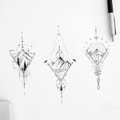 three different designs are shown on a white paper next to a pen and ink drawing