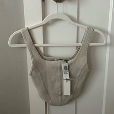 Super Flattering Cream Top From Aritzia! - Size Xs - Tried On But Never Worn Still With Tags! - Labeled“Sculpt Knit Bustier” - Stretchy Material Fitted Neutral Crop Top For Spring, Neutral Fitted Cropped Tops, Fitted Neutral Crop Top For Summer, Black Long Sleeve Leotard, Aritzia Hoodie, Aritzia Top, White Short Sleeve Blouse, Long Sleeve Leotard, Black Crop Top Tank