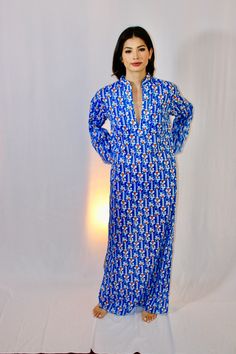 Low front, bell sleeve, maxi caftan. Semi-sheer deadstock cotton. No lining. Fitted Long Sleeve Kaftan For Beach, Fitted Long Sleeve Spring Kaftan, Fitted Maxi Length Kimono, Fitted Long Sleeve Kimono For Daywear, Blue Long Sleeve Thobe For Spring, Spring Fitted Kaftan With Kimono Sleeves, Spring Kaftan With Kimono Sleeves And Fitted Design, Blue Cotton Long Sleeve Kaftan, Fitted Cotton Long Sleeve Kaftan