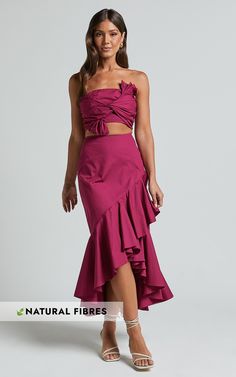 Get ready to turn heads in the Destiny Two Piece Set! This stunning co-ord skirt and crop top combo features a trendy knot detail on the crop top, adding a touch of flair to your outfit. The ruffle maxi skirt is made from high-quality poplin cotton, giving it a luxurious feel while also ensuring comfort. With its vibrant plum color, this set is perfect for parties or any special occasion where you want to make a statement. The strapless design adds an extra level of femininity and sophistication Skirt And Crop Top, Basic Black Dress, Maxi Skirt Set, Ruffle Maxi Skirt, Neon Outfits, Spring Maxi Dress, Bachelorette Dress, Top Skirt Set, Long Sleeve Knit Dress