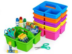 several plastic containers with scissors, markers and pencils in them on a white background