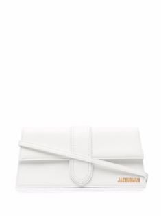 Bright-white leather Le Bambino Long tote bag from JACQUEMUS featuring gold-tone hardware, logo plaque, single shoulder strap and foldover top with magnetic fastening. Jacquemus Le Bambino Long, Jacquemus Bag, Bag Trends, White Bag, Leather Tote Bag, Shoulder Handbags, Shoulder Bag Women, Wallet Case, White Leather