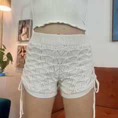 Coolest White Cream Crochet Knit Sweater Shorts // Ruched Tie Sides, High Waisted Fit With Elastic Waistband, Double Lined And Not See Through Brand: Miou Muse Size: M But Fits Like A S Model: 5’3 - 34b Bust - 27” Waist Material: Polyester Thats Thick With Stretch Condition: New With Tags Measurements Waist - 24” Unstretched 26” Stretched Hips - 32” Rise - 11” Length - 12.5” *By Purchasing You Agree To My Shop Policies* Romcomcore Balletcore Coquette Feminine Summer Knit Beach Bottoms, Knit Beach Shorts For Summer, Knit Bottoms For Summer Vacation, Summer Knit Bottoms Short Length, Summer Knit Short Bottoms, Knit Shorts For Beach In Summer, Knit Shorts For Summer Vacation, Knit Shorts For Spring Vacation, Casual Knit Beach Shorts