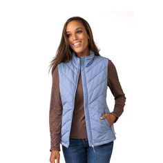 The Free Country Horizon Freecycle Vest For Women Is A Versatile And Essential Wardrobe Item That Can Be Worn All Year Round Making It Suitable For All Seasons, Lifestyles, Or Activities. Featuring A Stylish Stand Collar, Full-Zip Front Closure, Two Deep Zipper Hand Pockets And A Unique Quilting Detail. This Wind Resistant Vest Is Designed To Be A Functional And Fashionable Addition To Any Outfit, While Its Lightweight Construction Provides An Additional Layer Without Adding Bulk. The Ladies Fre Light Blue Outerwear For Winter Layering, Light Blue Casual Outerwear For Layering, Versatile Blue Outerwear For Layering, Womens Quilted Vest, Country Jackets, Lightweight Vest, Vest For Women, Essential Wardrobe, Country Blue