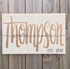 a wooden sign that says, personalized with the word's name on it