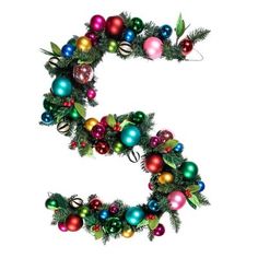 the letter s is made up of christmas balls and fir branches with ornaments on them