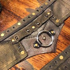 Gorgeous And One Of A Kind Piece! Handmade By The Designers At Royal Peasantry Boutique, This Belt Features A Center Ring, Studs And Leather Accents On A Canvas Base. Weathered And Worn To Look Straight Out Of A Mad Max Movie. Furiosa Would Have Loved This Belt. Belt Is Adjustable With Double Leather Straps To Tie In Back - Will Fit Most Sizes. Canvas Belt Is 22 Inches Long And 5 Inches Wide At Center. Perfect For Burning Man, Wasteland Weekend, A Furiosa Cosplay Or Your Next Festival! #Burningm Furiosa Cosplay, Moth Witch, Leather Pocket Belt, Mad Max Movie, Max Movie, Leather Utility Belt, Wasteland Weekend, Canvas Belt, Leather And Canvas