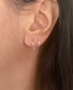 A pair of double open hoop hammered teardrop small earrings, fake double piercing hoops in sterling silver, 14k yellow or rose gold filled. These spiral hoops give the illusion of a second piercing (only one piercing is needed). The inner diameter of the hoops is about 9mm. The second ring that climbs up the ear is a bit smaller. The hoops are hypoallergenic, nickel and lead free. Note - the image on the photo is bigger than the actual size of the item to show details clearly. Please refer to the given measurements for the true size of the item. The item comes gift wrapped and bubble wrapped. Double Hoop Piercing, Double Piercing, Second Piercing, Double Hoop Earrings, Small Earrings, Silver Pieces, Jewelry Earrings Hoops, Sterling Silver Chains, Sterling Silver Necklaces