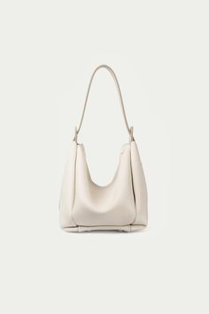 Advene | The Age Bag | Cream Leather Conditioner, Daily Essentials, Strap Tops, The Age, Cow Leather, Top Handle, Bucket Bag, Award Winning, Top Handle Bag