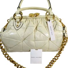 Brand: Marc Jacobs Model: Lather Shoulder Body Ivory & Gold Measurements: 11"X15"X6" Condition: Pre Owned Sold As Is Soft Description: Marc Jacobs Handbags Are Coveted For Their Distinctive Designs, Premium Craftsmanship, And Timeless Appeal. The Brand Offers A Wide Range Of Handbag Styles, Each Reflecting Marc Jacobs' Signature Blend Of Sophistication, Playfulness, And Modernity. Designer White Satchel With Gold-tone Hardware, Designer Cream Shoulder Bag With Dust Bag, Designer Cream Shoulder Bag, High-end White Satchel With Gold-tone Hardware, Designer Cream Shoulder Bag With Top Handle, Designer Cream Top Handle Shoulder Bag, Luxury Cream Satchel With Gold-tone Hardware, Designer Cream Satchel, White Designer Satchel For Formal Occasions