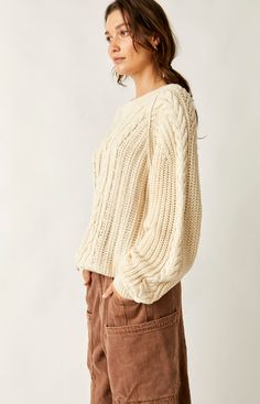 A new take on a forever classic, this staple sweater is featured in a chunky knit fabrication with timeless cable detailing throughout for an added special touch. Fit: Relaxed, slouchy fitFeatures: Scoop neckline, ribbed hems, slouchy fitWhy We <3 It: Just as cool as it is classic, this staple sweater is lovely for layering over a collared button down top, styling with a sweet skirt, or pairing with the perfect denim for totally timeless style. Hand Wash Cold Contents 100% Cotton Size & Fit: Mea Perfect Denim, Cable Sweater, Boutique Homes, Cable Knit Sweater, Skirt Pants, Chunky Knit, Timeless Style, Scoop Neckline, Cable Knit