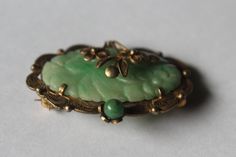 -Antique Chinese Sterling Sliver Filigree Carved Jadeite Pin Brooch -Total size: 1.5 in x 1.25 in -Small jadeite bead size: 5 mm -Total weight: 8.1 g -Tested sliver Sterling Silver Filigree, New City, Silver Filigree, Pin Brooch, Brooch Pin, Brooches, Carving, Beads, Sterling Silver