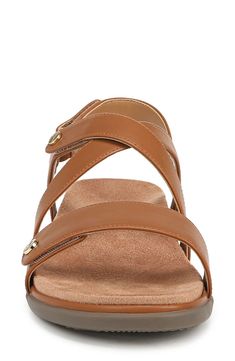 Adjustable straps offer a customized fit in a sleek leather sandal grounded by a contoured footbed and subtle wedge heel. 1 1/2" heel; 3/4" platform Adjustable straps with hook-and-loop closures Contoured footbed with arch support Leather upper/synthetic lining/rubber sole Imported Leather Working Group certified This product meets Nordstrom Responsible Sourcing and Manufacturing criteria: made with practices that meet higher environmental or social standards Synthetic Double Strap Wedge Sandals, Synthetic Double Strap Wedge Sandals With Heel Strap, Adjustable Slingback Synthetic Footbed Sandals, Adjustable Synthetic Slingback Footbed Sandals, Strappy Synthetic Wedge Sandals With Arch Support, Synthetic Strappy Wedge Sandals With Arch Support, Cushioned Slingback Wedge Sandals In Synthetic, Cushioned Slingback Wedge Sandals, Slingback Sandals With Removable Insole, Medium Width