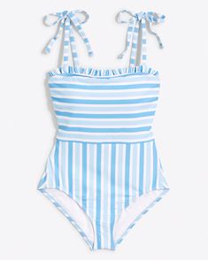 Hit the deck. Our Awning Stripe Smocked One Piece pairs a shipshape print and ruffles with adjustable straps and UPF 50+ sun protection, so it's equal parts pretty and practical. Pairs with:  Crinkle Cotton Tiered Dress Ruffled One Piece Swimsuit   Others like this: Awning Stripe Bikini Top Awning Stripe Mid Rise Bikin White Swimwear With Tie Straps For Summer, Striped Ruffled Swimwear For Poolside, Summer Swimwear With Tie Straps For Beach Party, Blue Swimwear With Tie Straps For Beach, Blue Tie-strap Swimwear For Beach, Striped Swimwear With Ruffles For Beach Season, Striped Ruffled Swimwear For Beach Season, Striped Ruffled Swimwear For Beach, Spring Swimwear With Ruffled Straps For Sunbathing