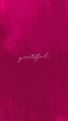 a pink background with the word grateful written in cursive writing on top of it