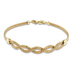 Lustrous diamond-cut chains embrace in shimmering double helix braids in the center of this alluring women's bracelet. 14K Yellow Gold The 7.5-inch fashion chain secures with a lobster clasp. From the Italia D'Oro Collection Exclusively available from Jared® the Galleria of Jewelry. Elegant Bracelets With Interwoven Design As Gift, Elegant Bracelets With Interwoven Design For Gift, Elegant Braided Bracelet Jewelry, Formal Yellow Gold Jewelry With Interwoven Design, Elegant Braided Jewelry As Gift, Elegant Braided Jewelry For Gifts, Elegant Braided Bracelets As Gift, Classic Braided Jewelry For Formal Occasions, Elegant Yellow Gold Braided Jubilee Bracelet