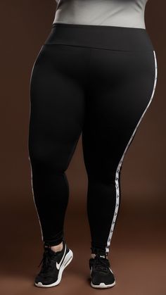 Take your active wear to the next level with this legging. Perfect for an active day at the gym or running errands around the city. This legging comes in a luxurious Nylon/Spandex material that is perfect for smoothing and holding everything in place. Style it up with our V-Neck Top (Black) Model is wearing a size 18/20 75% Nylon/25% Spandex Fits true to size TMC logo on on each side of the leggings Color may vary due to lighting on images Tmc Logo, Stitch Hoodie, Stylish Leggings, Everyday Leggings, Black Model, Loungewear Set, Comfy Hoodies, At The Gym, Basic Tops