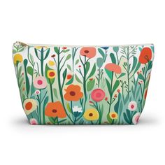 an image of a cosmetic bag with flowers on it