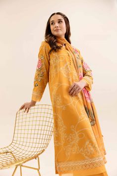 Brand: NishatCollection: Nishat Any Day Winter Unstitched CollectionFabric: Cotton DESIGN DETAILS: SHIRTPrinted Dobby Cotton Shirt: 3 Meter2 Embroidered MotifsFabric: Dobby CottonColor: Orange DUPATTADigital Printed Chiffon Dupatta: 2.5 MeterFabric: ChiffonColor: Orange TROUSERSSolid Dobby Cotton Trousers: 2.5 MeterFabric: Dobby CottonColor: Orange DISCLAIMER:* Lining, Laces, and Tassels are not included in unstitched variants.* Embellishment items in stitched outfits are subject to market availability.* The actual colors of the outfit may vary from the colors being displayed on your device. CARE INSTRUCTIONS: Extra Fabric Has Been Used For Shoot Original Color May Vary Slightly From The Picture Dry Clean Recommended Iron The Clothes At Moderate Temperature Do Not Use Bleach, Or Stain Remo Mulmul Unstitched Suit For Spring, Semi-stitched Yellow Cotton Lawn Suit, Semi-stitched Cotton Lawn Suit In Yellow, Yellow Mulmul Unstitched Suit, Yellow Unstitched Mulmul Suit, Embroidered Yellow Mulmul Lawn Suit, Yellow Cotton Unstitched Suit With Printed Motifs, Embroidered Yellow Lawn Suit With Straight Kurta, Yellow Embroidered Unstitched Suit In Mulmul