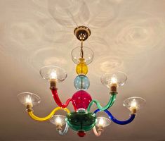 a multicolored chandelier hanging from the ceiling