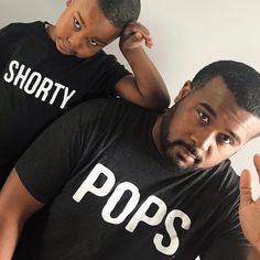 Pops Shorty©  tees are amazingly soft and perfect to match with son for football night, game day. Great Father and son bonding t-shirt set. Also an adorable girl Dad selection. HOW TO PURCHASE:  **Select each item you need from the drop down and add to cart** HOW DOES THE SHIRT FIT? * Kids Fit True to Size/Unisex * Men Fit True to Size/Unisex * Suggest women to size down/Unisex Fit MATERIAL OF SHIRT? Adult/Kids:   * 50% polyester/25% combed cotton/25% rayon  jersey * Color is Black BABY BODYSUIT Father's Day Team Spirit Tops With Letter Print, Casual Tops For Game Day On Father's Day, Family Matching Tops With Letter Print For Game Day, Short Sleeve Tops With Funny Text For Game Day, Family Matching Game Day Tops With Short Sleeves, Everyday Family Matching Tops With Text Print, Father's Day Matching Letter Print Tops, Vacation Clothing, Matching Clothing