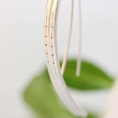 "These stunning 56mm (2 1/4\") long, sterling silver threader earrings feature five 14k yellow gold droplets. They are made by hand and tumbled to a glowing matte finish. Light and wearable, they hang from comfortable sterling silver earring wires. This pair truly makes a statement; I love these earrings and often give them as gifts to my own friends. This earring pair will ship via USPS First Class Mail within 3-5 days of payment." Modern Silver Long Drop Threader Earrings, Modern Long Drop Linear Earrings As Gift, Classic Long Drop Threader Earrings, Nickel-free Long Drop Threader Earrings, Modern Pierced Linear Earrings For Anniversary, Modern Linear Pierced Earrings For Anniversary, Minimalist Long Drop Earrings For Anniversary, Nickel-free Yellow Gold Linear Earrings In Sterling Silver, Everyday Sterling Silver Long Drop Earrings