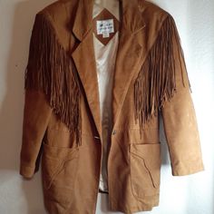 Gorgeous Retro Alamo Leather Wear Small Tan Suede Leather Fringe Tassled Jacket. Procured During Personal Travel Similar Jackets Retail For $350 Fall Leather Outerwear With Fringe, Fall Leather Jacket For Rodeo, Leather Fringe Outerwear For Fall, Leather Outerwear With Fringe For Rodeo, Vintage Leather Outerwear For Rodeo, Leather Fringe Outerwear For Rodeo, Western Leather Outerwear With Fringe, Western Leather Fringe Outerwear, Western Style Leather Jacket For Workwear In Winter