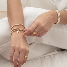 as a best-selling signature piece from our Dreamer Series, we are introducing all-new beaded bracelet styles. these have rapidly become an acclaimed favorite for a reason. our material upgrades to 14k US gold filled + sterling silver ensure that this bracelet will endure daily wear. worn solo or added to your arm candy; in all cases, remember to Dream On. demi-fine 14k US gold filled 3mm beads 18k gold triple plated over brass charm 6.5", stretchy sold individually shop all Beaded Bracelets Minimalist Yellow Gold Stretch Bracelet For Everyday, Adjustable Hypoallergenic Bracelet In 14k Gold, Adjustable Hypoallergenic Bracelets In 14k Gold, Hypoallergenic Adjustable Bracelets In 14k Gold, Adjustable Hypoallergenic 14k Gold Bracelet, Elegant Jewelry With Letter Beads For Everyday, Everyday 14k Gold Hand-strung Beaded Bracelets, Adjustable Classic Charm Bracelet, Everyday Resizable 14k Gold Filled Jewelry