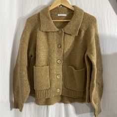 Nwot Staccato Oversized Mustard Brown Button-Up Or Pullover Sweater. 2 Front Pockets. Size:Small. 35% Acrylic 25% Nylon 40% Polyester. Bust: 22” Front Length From Pit: 12” Back Is Slightly Rounded From 12”-14”-12”Length Dry Clean Only. Offers & Counter Offers Welcome! Bundle & Save! Thank You For Stopping By! Hundreds Of New Items Still To List! Please Come Again! Oversized Tunic, Beige Cardigan, Short Sleeve Cardigan, Oversized Cardigan, Pullover Sweater Women, Striped Cardigan, Color Block Sweater, Brown Sweater, Softest Sweater