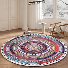 a large round rug in the middle of a room