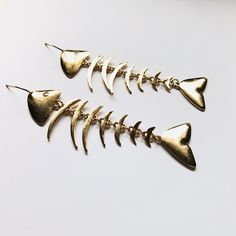 Super cute fishbone dangle drop earrings. We have a matching necklace Not intended for children ages 13 and under. Also, for many items we can accommodate large orders, so please send us a message. Fish Bone Earrings, Fish-shaped Metal Jewelry For Gifts, Fish-shaped Metal Jewelry As A Gift, Fishbone Earrings, Fish Skeleton, Bone Earrings, Deep Autumn, Fish Bone, Matching Necklaces