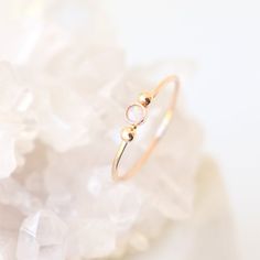 A solid 14k gold little beauty. Our dainty little gold diamond ring is accompanied by two solid 14k gold dew drops.  Perfectly understated, feminine and sweet.  Personalize your slim gold ring by selecting a stone to represent a birthday, as an engagement ring or just because (see last photo)!{DETAILS}:* select a natural diamond or lab grown 3mm cz diamond / birthstone (all conflict free!)* solid 14k gold bezel cup and band* solid 14k gold drops (on either side of the gemstone)* 1mm solid 14k go Diamond Birthstone Ring, Make Up Gold, Stackable Birthstone Rings, Birthstone Ring Mothers, Gold Ring Wedding, Mothers Ring, Diamond Birthstone, Mother Rings, Dew Drops