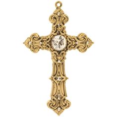 Express your style with Ornate Rhinestone Cross Pendant! Made of metal, this charming pendant is shaped like an ornate cross with a rhinestone center and swirled details. Wear it on a chain with your favorite outfit! Details: Length: 2 1/16" Width: 1 5/16" Thickness: 1/16" Metal Color: Gold Card contains 1 pendant. Ornate Cross, Cross Nails, Gold Card, Cross Christian, Cross Art, Jewelry Charms Pendants, Goth Jewelry, Rhinestone Cross, Gold Cross Pendant