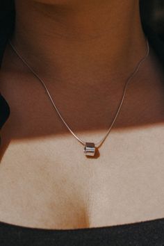 Women Owned + Operated | Hand Crafted To Order | Size Inclusive | Sustainably Made | High Quality Metals | Nickel-Free | Ethically Sourced A refined silver necklace, adorned with a snake chain and a minimalist square cube bead pendant. This necklace can be great for everyday wear or for a special evening out. It's simple, clean and eye-catching. This necklace comes with a 100% sterling silver snake chain. Every piece is organic and unique -- no two pendants are exactly alike. This item is hand-c Box Necklace, Bead Pendant, Silver Snake Chain, Square Bead, Necklace Box, A Snake, Gift For Wife, Necklace Sterling Silver, Beaded Pendant