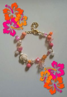 Gorgeous hibiscus bracelets, perfect for the summer! Cute Orange Bracelet, Pink And Orange Jewelry, Trendy Flower-shaped Vacation Jewelry, Trendy Flower-shaped Jewelry For Vacation, Trendy Flower Jewelry For Vacation, Trendy Flower Shaped Jewelry For Vacation, Bohemian Flower Bracelets For Vacation, Pink Flower-shaped Jewelry For Vacation, Summer Flower Jewelry For Vacation