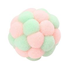 a pink, green and white pom - pom ball on a white background