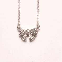 Beautiful Rhinestone Bow Necklace, 17" + 3" Extension Chain, Nwot. Great Gift Or For Yourself! Adorable! Sterling Silver Rhinestone Necklace For Gift, Adjustable Sparkling Necklace As A Gift, Adjustable Sparkling Necklace For Gift, Sparkling Adjustable Necklace For Gift, Adjustable Sparkling Silver Necklace, Adjustable Rhinestone Necklace As Gift, Adjustable Bling Cubic Zirconia Necklaces, Adjustable Bling Cubic Zirconia Necklace, Adjustable Rhinestone Bling Necklace For Gift