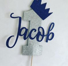 a cake topper with the word jack on it