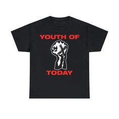 "Black Youth of Today t-shirt with the iconic \"X'ed Fist\" and red logo printed on the front. Premium unisex 100% cotton tee. Youth of Today is an American hardcore punk band, initially active from 1985 to 1990 before reforming in 2010. The band played a major role in establishing the \"Youth Crew\" subculture of hardcore, both espousing and evolving the philosophies of the straight edge and vegetarian lifestyles. The quintessential classic cotton t-shirt, this Gildan Heavyweight Tee is the centerpiece for any combination of t-shirt basics. 100% preshrunk cotton means the size and style will remain true after laundering. Points of wear, like the neckline, sleeves and bottom hem, are double-needle stitched for added durability. Shoulder-to-shoulder taping adds comfort by covering the raw e Black Band Logo T-shirt With Relaxed Fit, Red Band Logo T-shirt, Black Band Logo T-shirt Relaxed Fit, Black Band Logo T-shirt In Relaxed Fit, Black Relaxed Fit T-shirt With Band Logo, Unisex Band Logo T-shirt Crew Neck, Band Logo T-shirt With Crew Neck, Band Logo Crew Neck T-shirt, Red Punk T-shirt For Streetwear