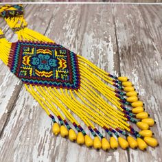 Western Seed Beads Necklace Yellow And Multi Color 31" Long Necklace Yellow Bohemian Necklace With 108 Beads, Long Necklace With Faceted Beads For Festivals, Festival Long Necklace With Colorful Beads, Festival Long Necklace With Large Round Beads, Yellow Long Bohemian Beaded Necklace, Colorful Beads Long Necklace For Festival, Adjustable Yellow Necklace With Dangling Beads, Adjustable Long Necklace With Large Beads For Festivals, Festival Long Necklace With Colorful Round Beads