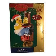 the simpsons christmas ornament is in its box