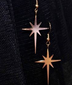 Gold plating or Silver 925 Star Earrings, designed as the star of Bethlehem, which makes them also a perfect Christmas gift. Star Long Dangle Earrings made of 14 karat gold plated brass or strling silver. These unique long dangle earrings feature beautiful matte gold plated over brass star dangling from ear wire. Chic and stylish earrings! These earrings measure approx 35/22 mm from the top of the star to the bottom of the star. Star-shaped Single Earring As Gift, Star Shaped Single Earring As Gift, Star Shaped Single Earring For Gift, Rose Gold Star-shaped Pierced Jewelry, Star-shaped Pierced Earrings As Gift, Star-shaped Pierced Earrings For Gifts, Star Shaped Pierced Earrings For Gifts, Rose Gold Star Jewelry For Parties, Rose Gold Star-shaped Party Jewelry