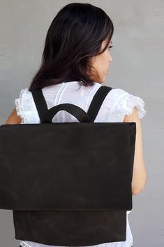 Our Backpack has a timeless design with simple lines that will complete your casual stylish look! A great choice as a Work Bag or as a School Bag Or even as a Diaper Bag. *Available in Smaller size. The bag has one large compartment, a zipper closure and an inside open pocket.  #Black #BlackBag #Leather #Backpack #BlackLeatherBackpack #LeatherBag #LeatherBackpack #LeatherCraft #LeatherGift #MinimalistBag #MinimalistDesign #SpecialGift #Handmade #Handcrafted #HandmadeBag #Women'sBag #GiftsIdeas Rectangular Backpack With Leather Handles For Commuting, Everyday Rectangular Backpack With Leather Backing, Soft Leather Rectangular Backpack For Commuting, Rectangular Everyday Backpack With Leather Backing, Rectangular Commuting Backpack With Leather Handles, Rectangular Soft Leather Backpack For Commuting, Soft Leather Commuting Backpack, Leather Backpack With Leather Handles For Everyday, Everyday Leather Backpack With Leather Handles