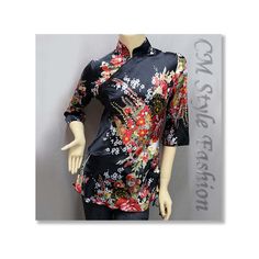 Product Condition : 100% Brand New Color :  Black Base w/ Floral Prints Material : Satin (Polyester 92%, Elastane 8%) Product Features : * A stunning beautiful Oriental Chinese style tunic top. Gorgeous prints of oriental / Eastern influence  Please note that the prints are of an artistic and randomly distributed pattern, the way the prints appear will vary on different tops * Mandarin collar. Closure diagonally at the chest and shoulder area. Quartered sleeves. Chinese style knot-and-loop style Satin Tunic, Chinese Cheongsam, Womens Tunics, Cheongsam, Mandarin Collar, Quarter Sleeve, Chinese Style, Tunic Top, Womens Clothing Tops