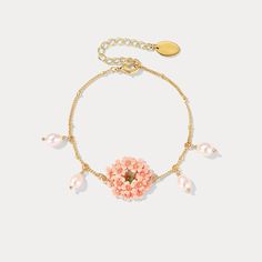 This Pink Verbena Bracelet crafted from exquisite Selenichast is an elegant accessory to enhance any look. With its timeless design and subtle shimmer, it makes for a beautiful statement piece that exudes luxury. Detail Plating: 18K Gold Materials: 18K Gold on Brass, Enamel, Freshwater Pearl Size: Length:6.1"(15.5cm)+Extender: 1.77"(4.5cm) Weight: 8.6g Hypoallergenic design Handmade Elegant Gold-plated Pearl Bracelet, Elegant Handmade Gold-plated Pearl Bracelet, Elegant Handmade Gold Plated Pearl Bracelet, Formal Rose Gold Flower Bracelet, Elegant Pink Chain Bracelet With Adjustable Chain, Delicate Gold Bracelets With Oyster Bracelet, Delicate Gold Oyster Bracelet, Luxury Gold Flower Bracelet, Elegant Pink Gold-plated Bracelets