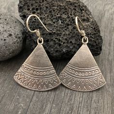 Simple yet beautiful silver triangular earrings, with small hand stamped details. Perfect earrings for any occasion, easy to match to any outfit. This are flat and light weight what makes them easy to wear. A pair to wear and never take off. They are 3.4cm- 1.45inch long 3.3cm- 1.30inch wide. They have a drop length of 5cm- 2 inch A unique addition to your jewelry collection. To see more unique silver earrings, click the link below https://www.etsy.com/shop/AkashiJewelry?ref=seller-platform-mcna Bohemian Triangle Earrings With Ear Wire, Nickel Free Triangle Sterling Silver Earrings, Nickel-free Triangle Sterling Silver Earrings, Sterling Silver Triangle Jewelry With Matching Earrings, Bohemian Triangle Nickel-free Earrings, Nickel-free Triangle Bohemian Jewelry, Nickel-free Bohemian Triangle Jewelry, Bohemian Triangle Nickel-free Jewelry, Nickel-free Triangle Sterling Silver Jewelry