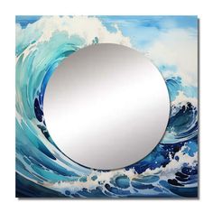 a round mirror sitting on top of a blue ocean wave painted wallpaper with waves in the background