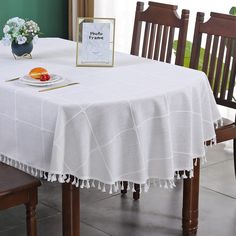 PRICES MAY VARY. SIZE GUIDE: This oval embroidered tablecloth is 60x102 inch (155x260 cm). There may be a slight deviation due to manual tailoring. Please measure the length and width of your table. As the size guide shown, it's recommended for oval tables from 36x78 inch to 44x86 inch, such as dining tables, buffet tables, garden tables, kitchen tables and other tables as long as they fit the rustic table cloth, with a droop length about 8 to 12 inch. TASSEL DESIGN: The linen tablecloth with em Oval Tables, White Table Cover, Farmhouse Tablecloths, Cover Wrinkles, Coffee Table Cover, Garden Tables, Table Cloth Decorations, Rustic Fabric, Oval Tablecloth