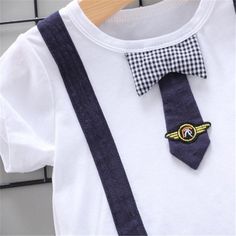 Product Title:Grow Boy Tie T-shirt & Solid Color ShortsKeyword Tag:wholesale baby clothes vendors,kids,Suit* Suitable For Season:Summer* Thickness:Regular* Package included:2 Pieces* Fabric:Cotton* Wash Label:On the inside Clothes Vendors, Tie T Shirt, Wash Label, Tied T Shirt, Boys Ties, Color Shorts, Toddler Boys, Fabric Cotton, Season Summer