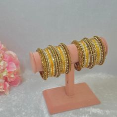 This includes 2 half stacks of golden bangle set with antique gold mixed gold dot metal bangles.  Avialable in 12 different colours to choose from ✨ Ready to ship 📦 Festive Gold Beaded Bangle Bracelets, Gold Beaded Bangle Bracelet For Celebration, Traditional Gold Beaded Bracelets For Celebration, Adjustable Yellow Bangle For Festivals, Festive Gold Beaded Party Bracelets, Festive Yellow Bangle Bracelet, Gold Beaded Bracelets For Party Festivals, Yellow Bangle Bracelets For Festivals, Gold Beaded Bracelets For Party And Festivals